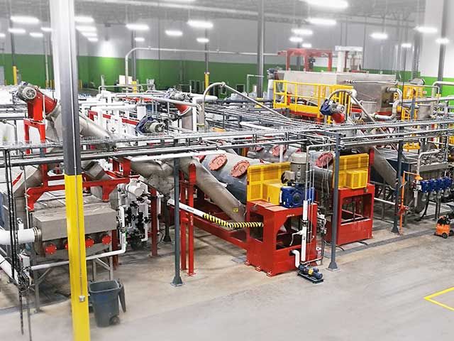 Riciclaggio bottiglie di plastica con Amut